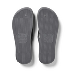 Archies Arch Support Thongs in charcoal pictured upside down from the bottom