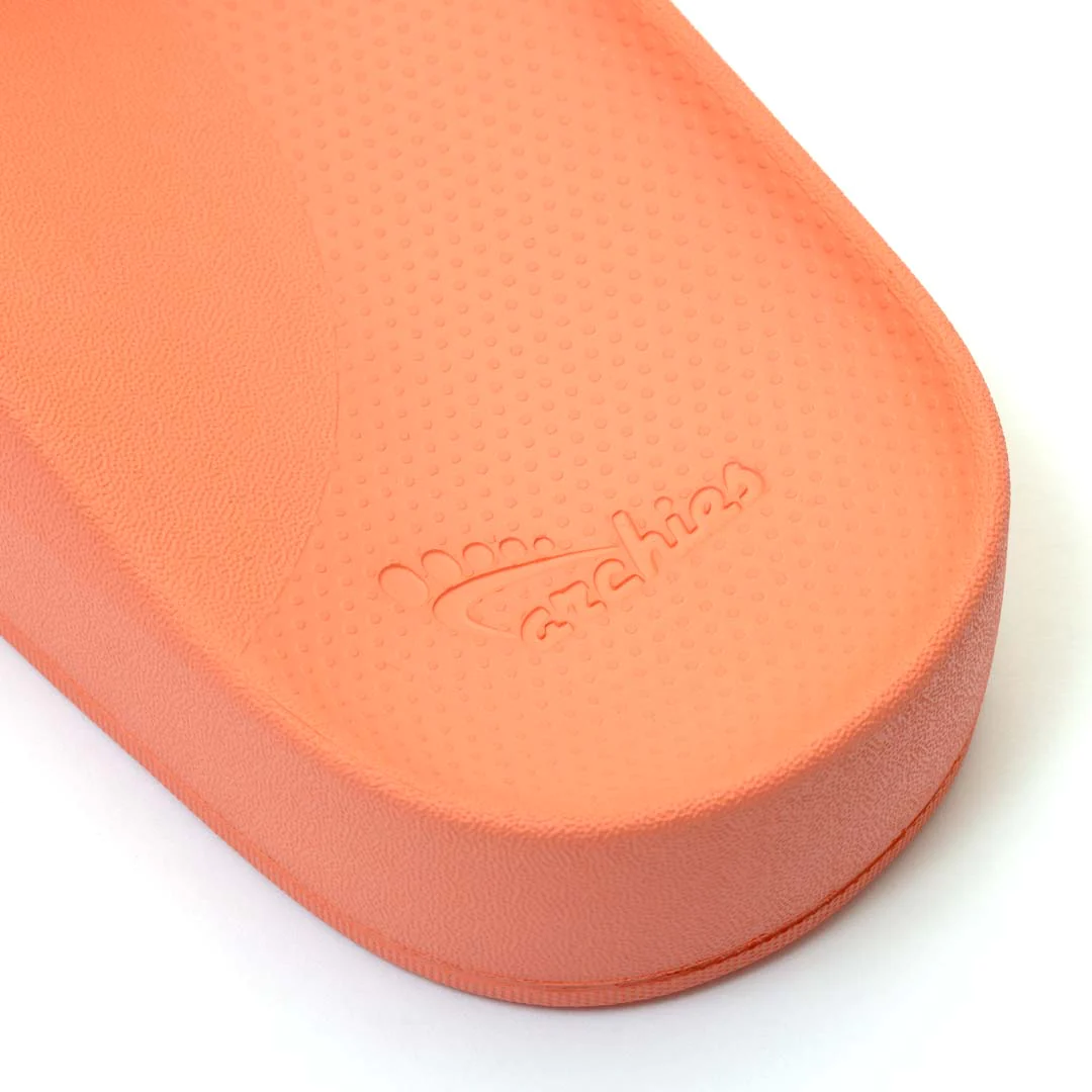 Archies arch support slides in a peach style showing the heel of the slide