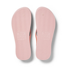 Archies Arch Support Thongs in pink shimmer pictured upside down from the bottom