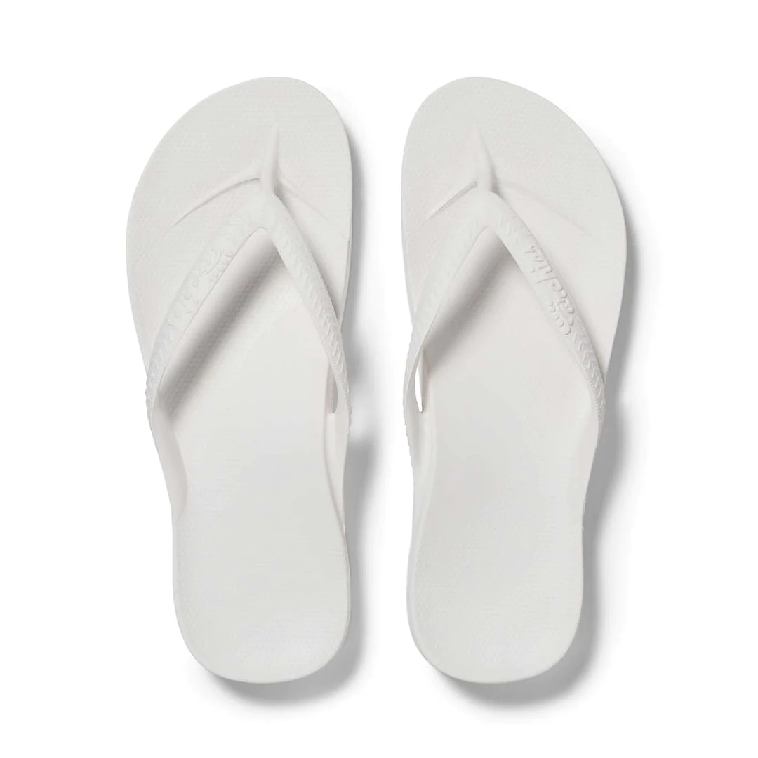 Archies arch support thongs in white shown from above